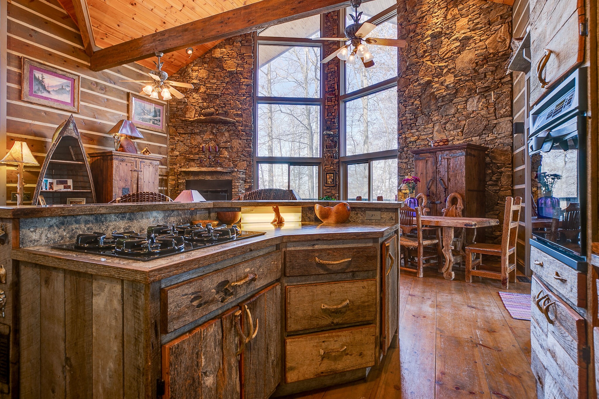 660 Rocky Top Road Sparta, TN 38583 - Photo 21 of 39 a kitchen with a stove and cabinets
