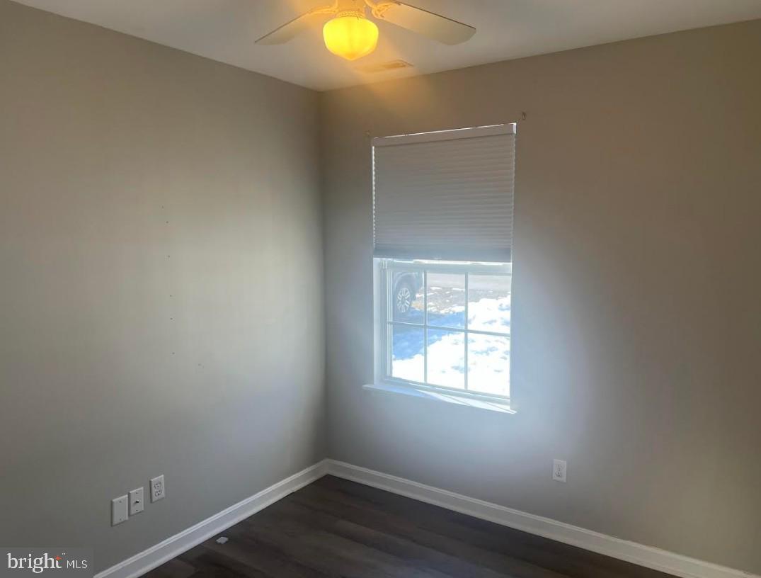 105 Gravel Run Road Grasonville, MD 21638 - Photo 3 of 12 an empty room with a window