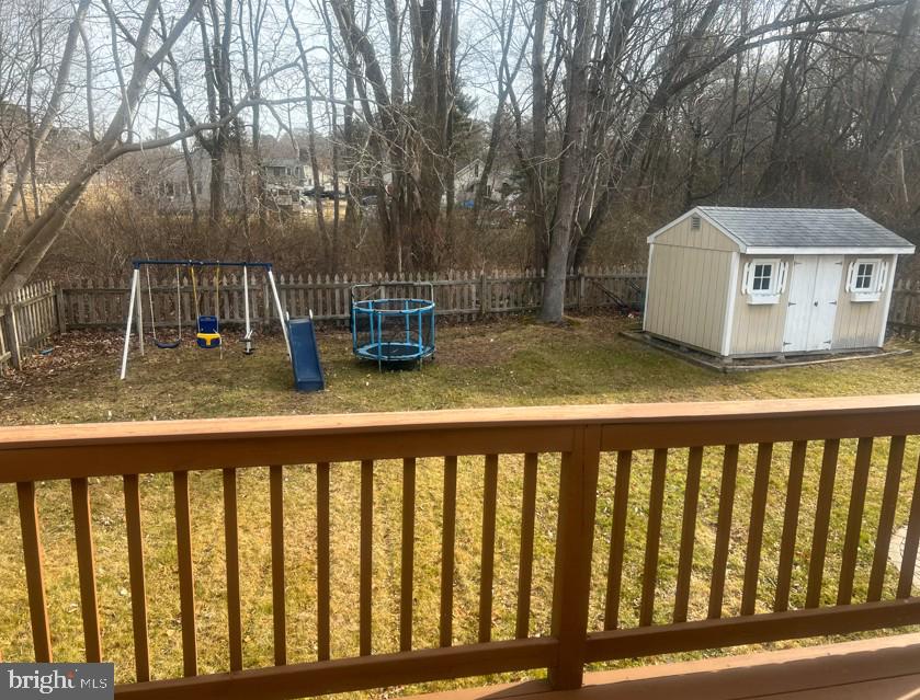 105 Gravel Run Road Grasonville, MD 21638 - Photo 10 of 12 a view of a house with backyard and sitting area