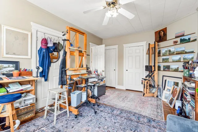 a view of a room with furniture and toys