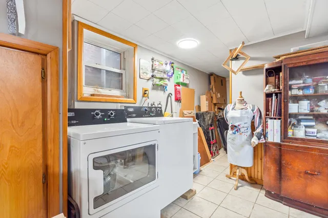 a view of living room with furniture and windows