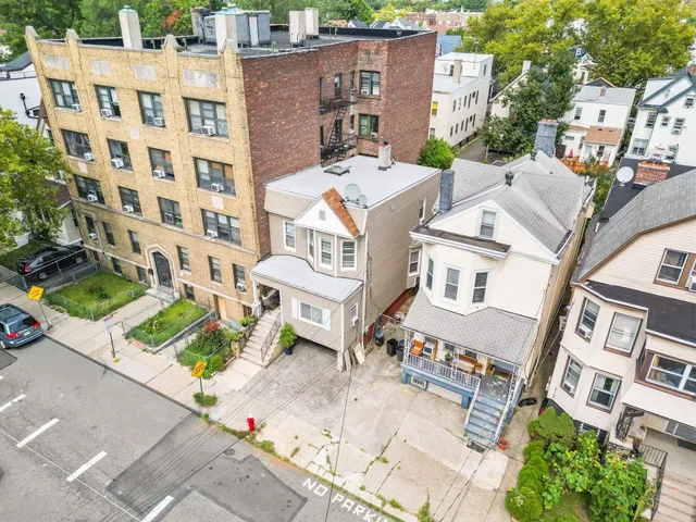 front view of a building with a street