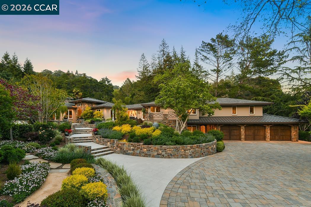4090 Happy Valley Road Lafayette, CA 94549 - Photo 1 of 1 a front view of a house with a yard and potted plants