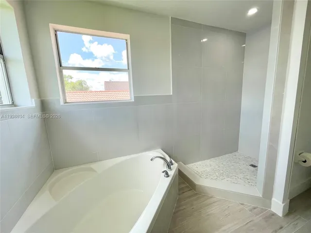 a bathroom with a bathtub