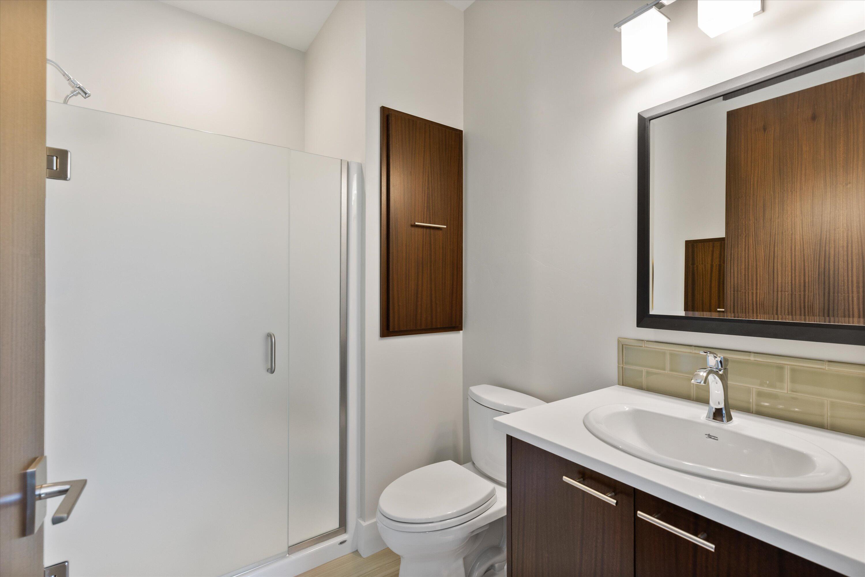 16389 South W Brasada Ranch Road Powell Butte, OR 97753 - Photo 48 of 63 a bathroom with a sink toilet and mirror