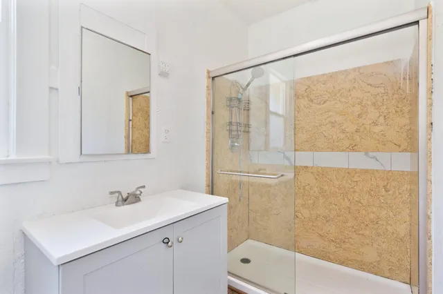a view of storage and utility room with washer and dryer