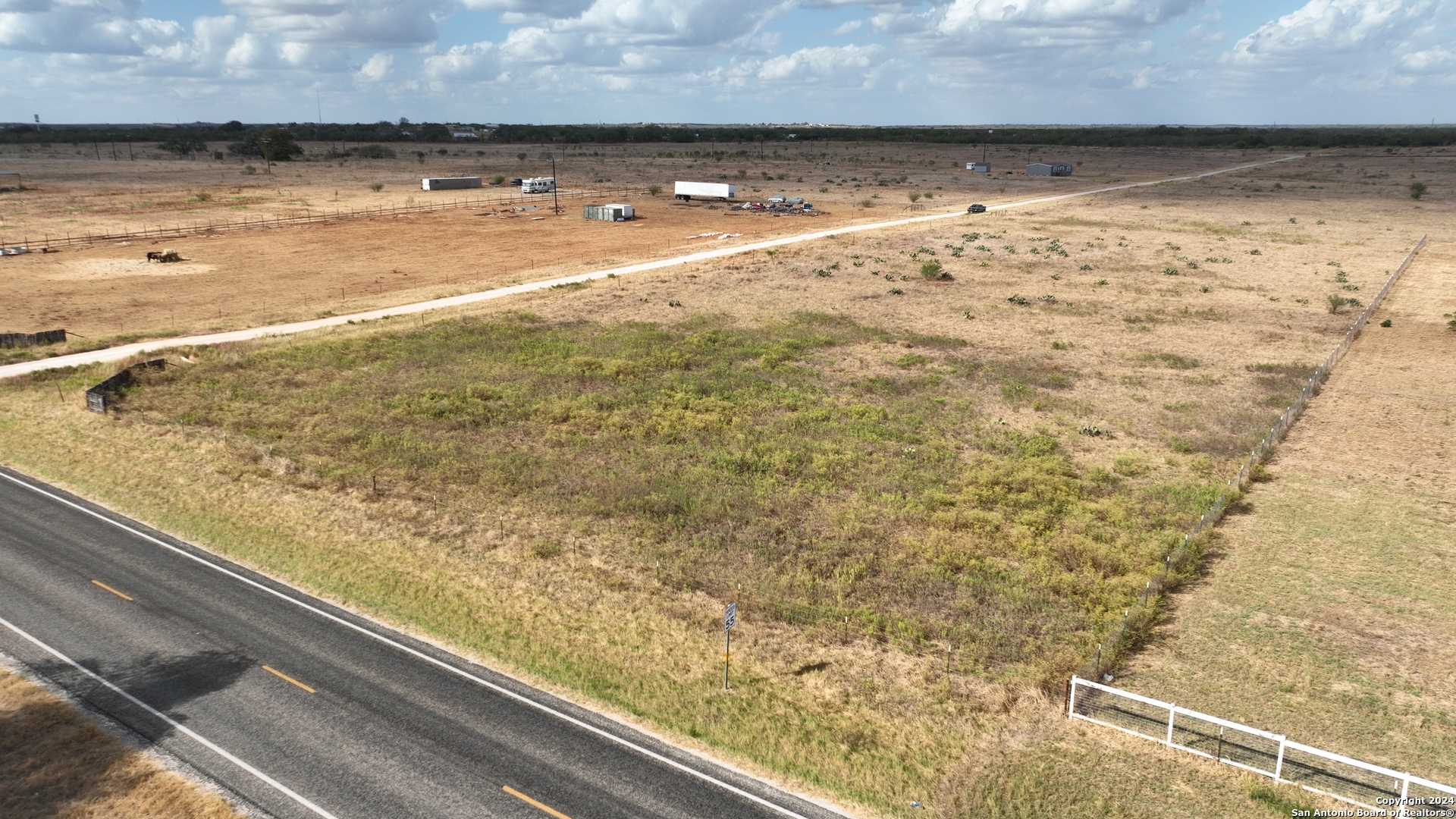 0 Fm 462 Moore, TX 78057 - Photo 4 of 12 a view of a lake from a window
