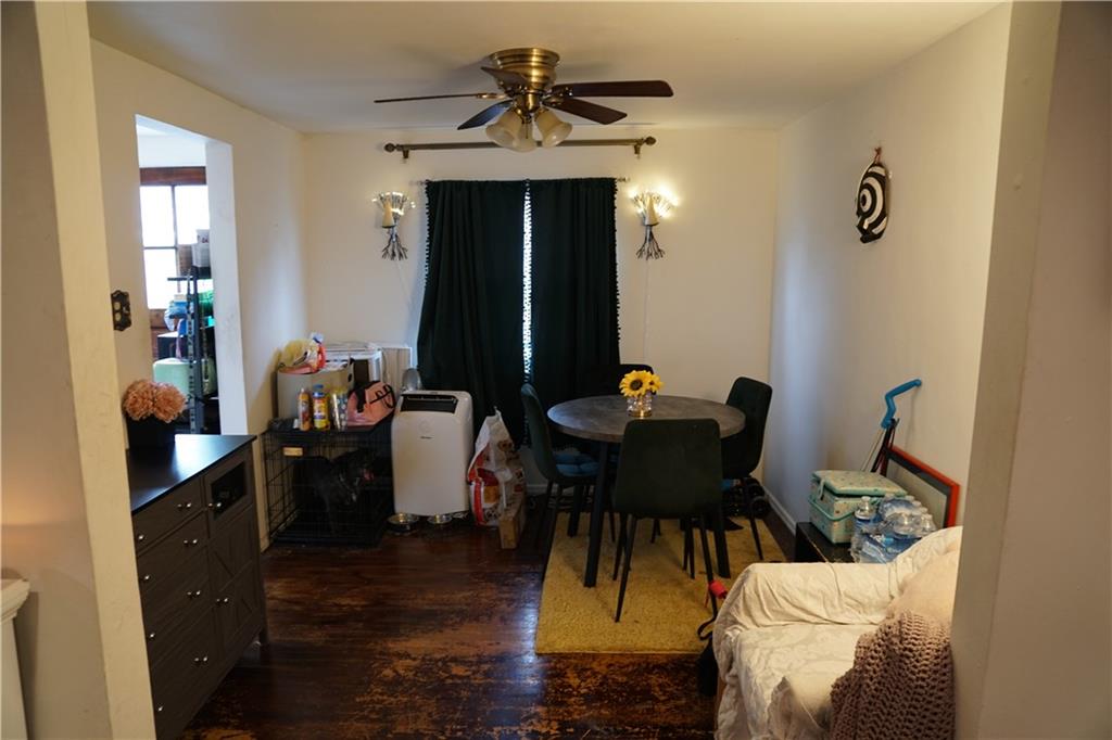 2003 Lafayette Street Pittsburgh, PA 15218 - Photo 3 of 12 a view of a dining room with furniture and wooden floor