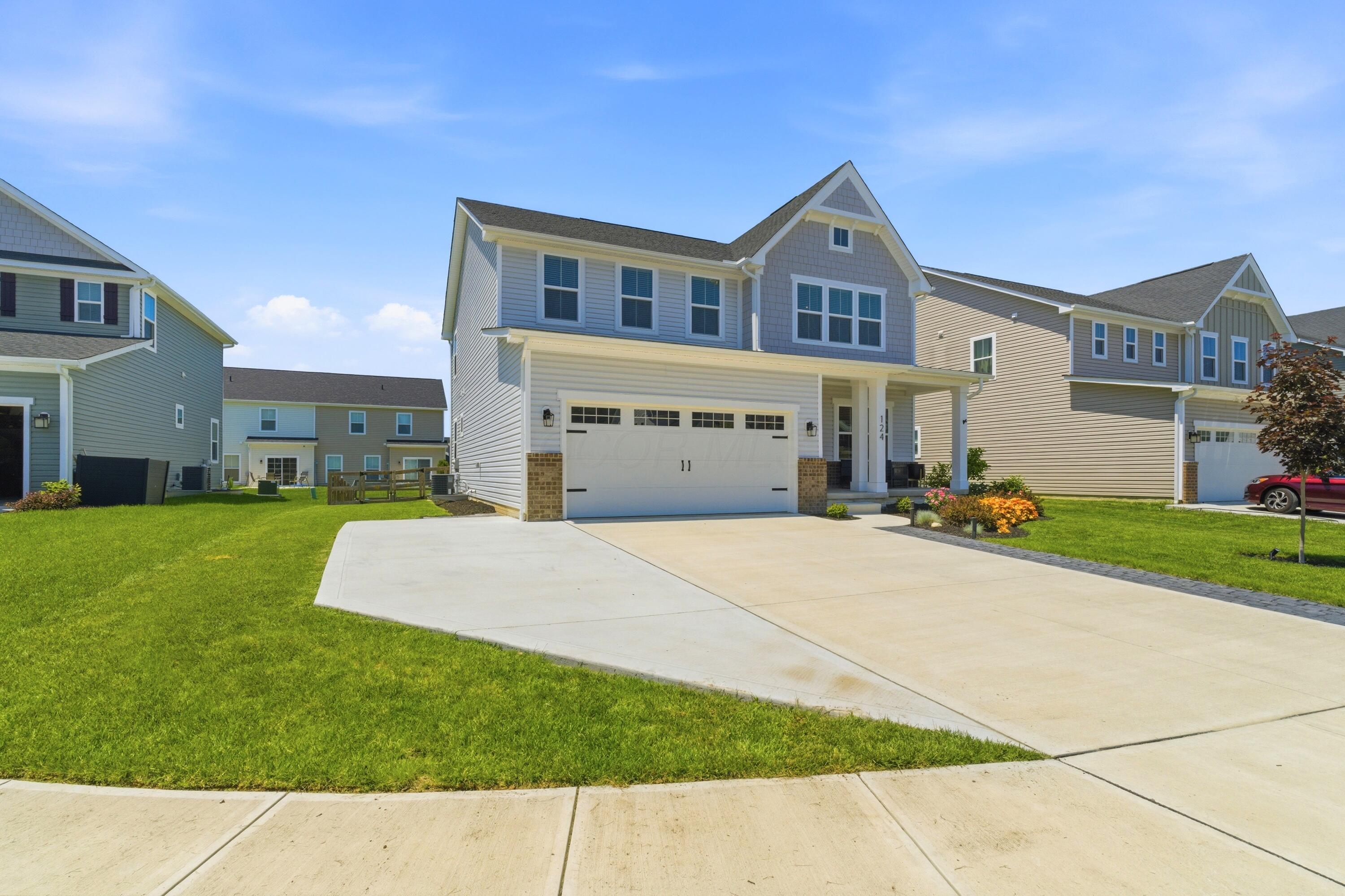 124 Steeplechase Street Delaware, OH 43015 - Photo 62 of 64 Front Exterior/ Extended Driveway Pad