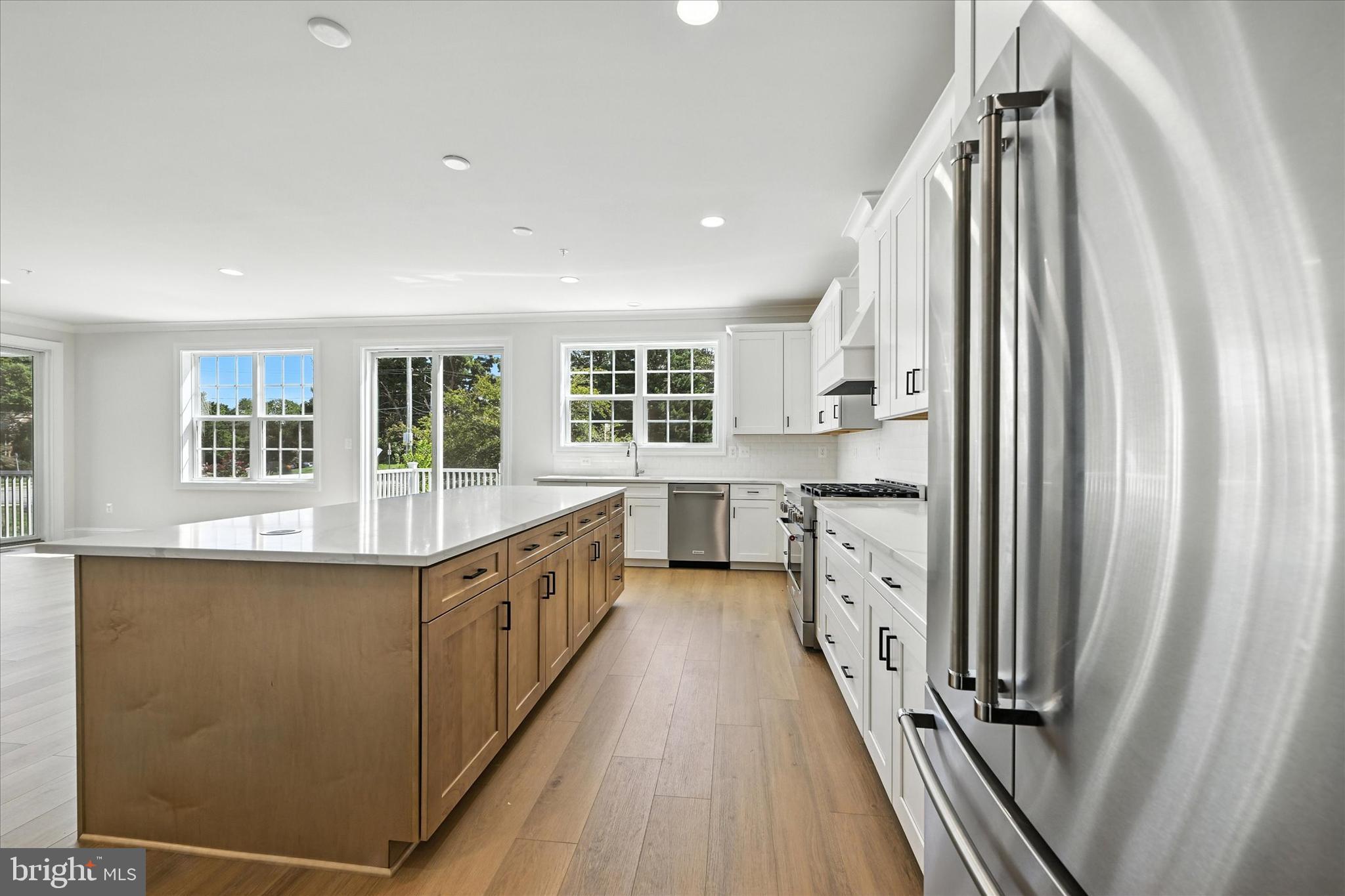 106 Villabrook Way Baltimore, MD 21212 - Photo 17 of 60 a large kitchen with a sink and large window