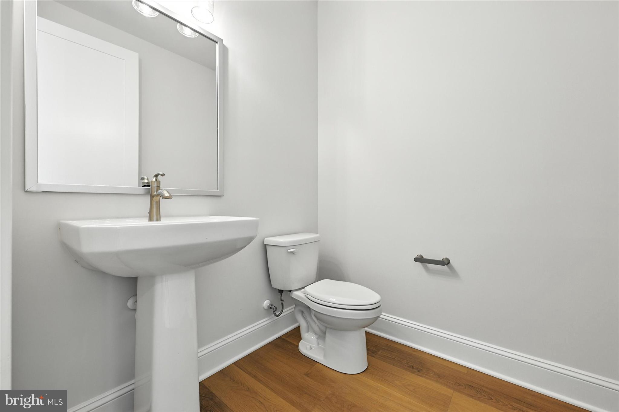 106 Villabrook Way Baltimore, MD 21212 - Photo 22 of 60 a bathroom with a sink and a toilet