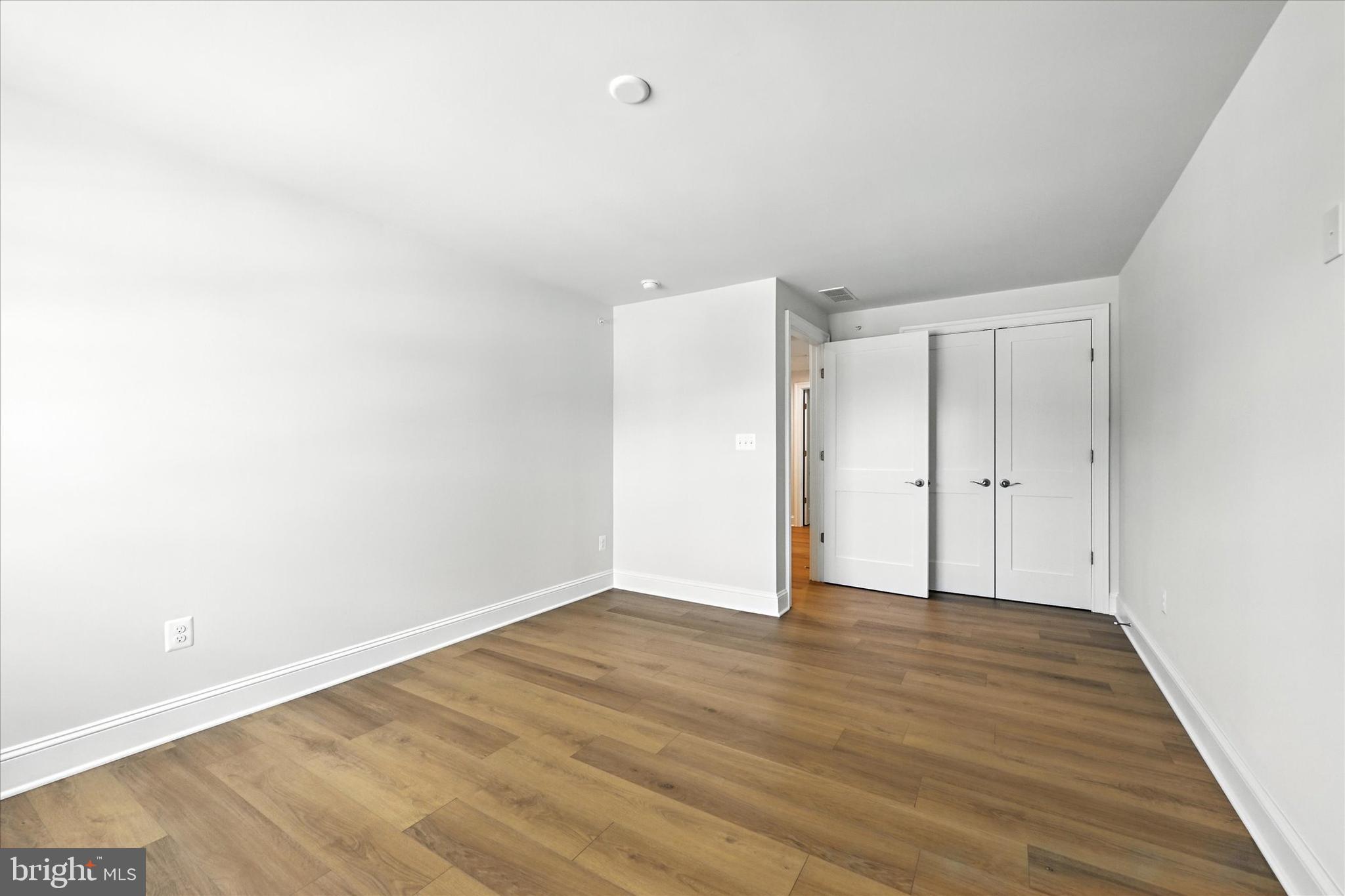 106 Villabrook Way Baltimore, MD 21212 - Photo 31 of 60 a view of an empty room with wooden floor