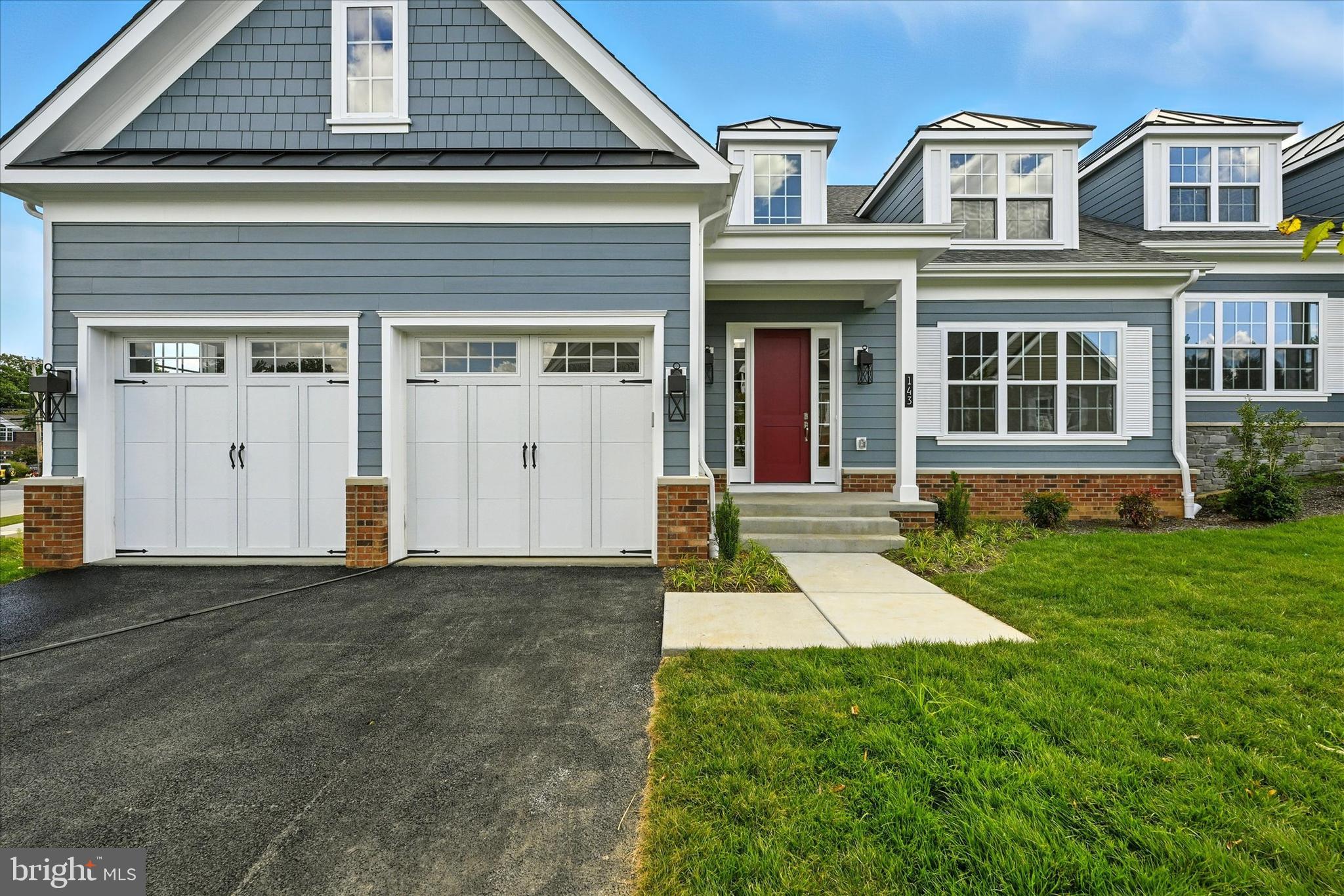 106 Villabrook Way Baltimore, MD 21212 - Photo 4 of 60 front view of a house with a yard
