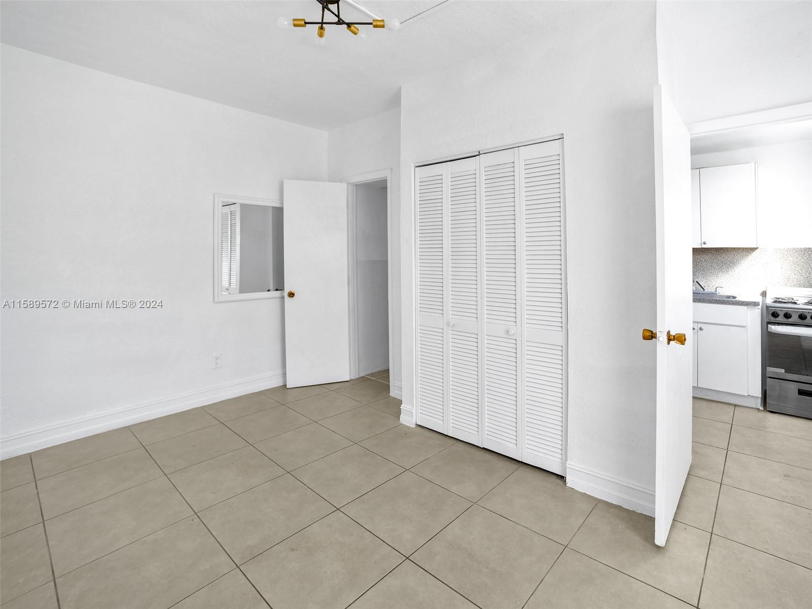 265 East 7th Street Hialeah, FL 33010 - Photo 11 of 28 a view of a livingroom with an empty space