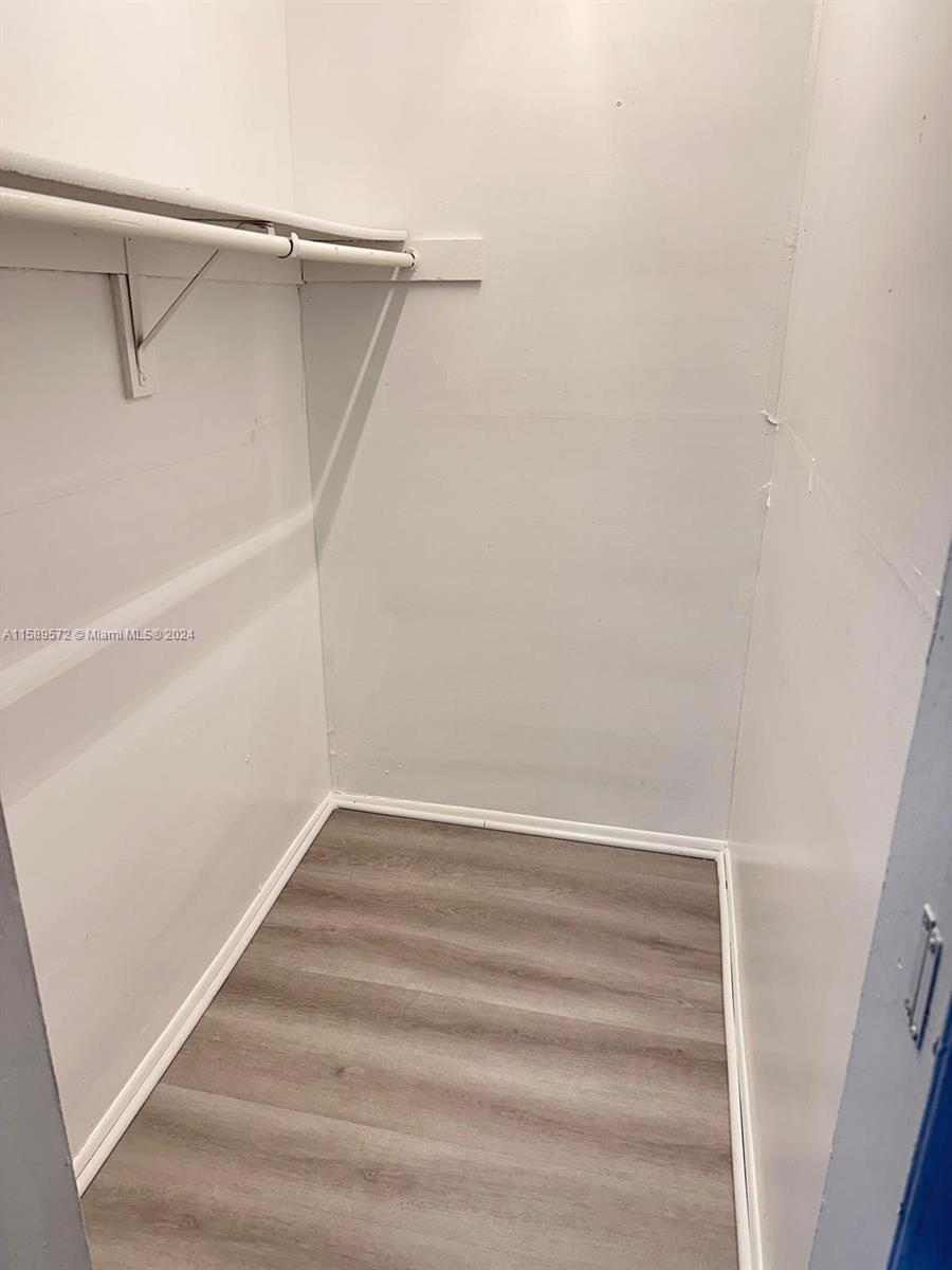 265 East 7th Street Hialeah, FL 33010 - Photo 26 of 28 a view of an empty walk in closet