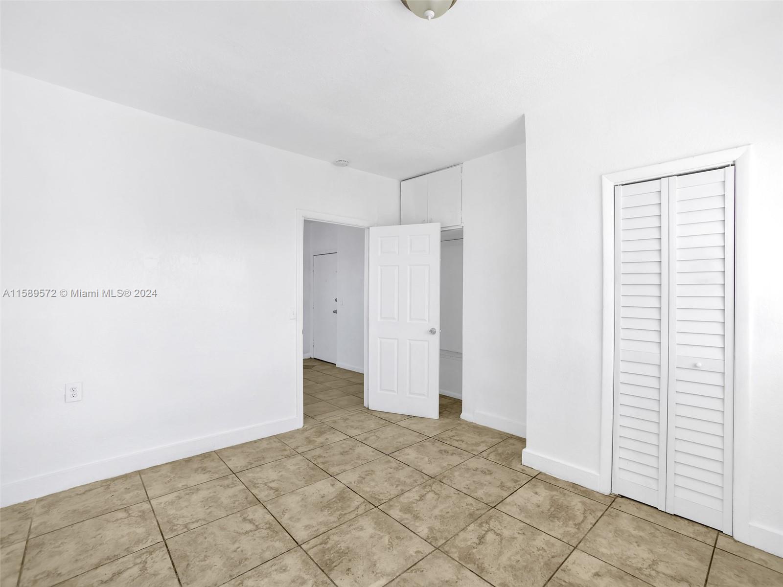 265 East 7th Street Hialeah, FL 33010 - Photo 10 of 28 a view of an empty room