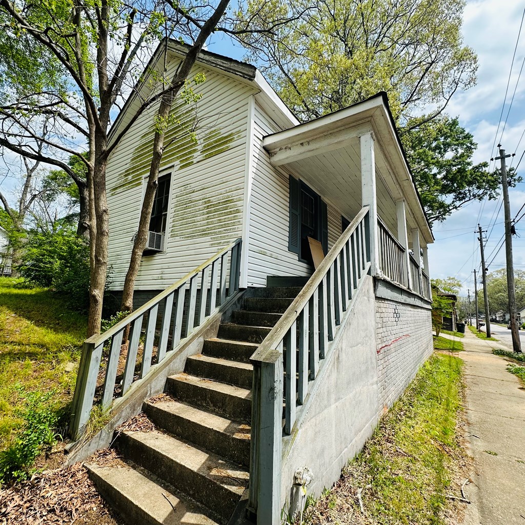 108 Avenue G Thomaston Ga 30286 Thomaston, GA 30286 - Photo 7 of 7 a view of a house with wooden stairs