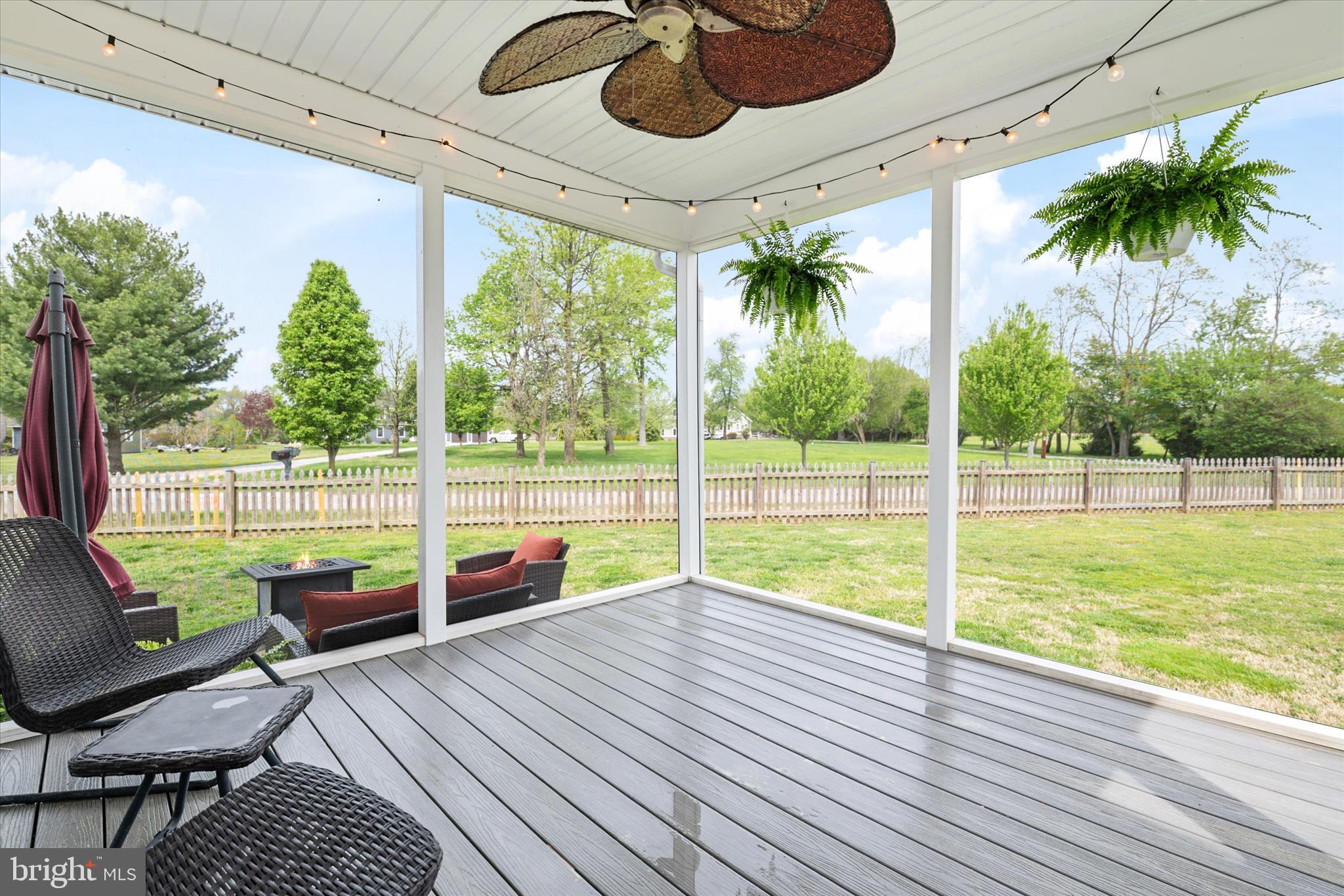 200 Newtown Road Chester, MD 21619 - Photo 20 of 50 a view of a deck with couches with wooden floor and outer view