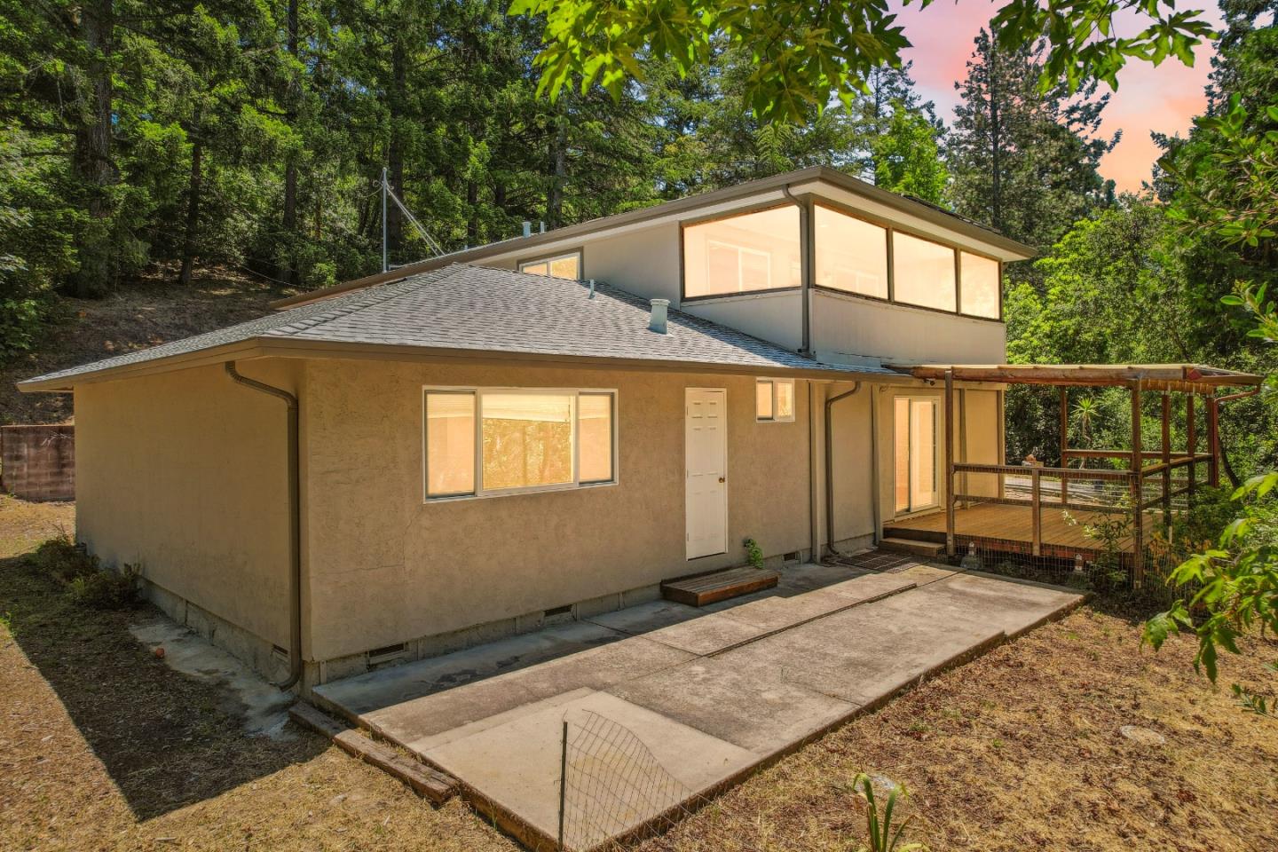 24895 Skyland Road Los Gatos, CA 95033 - Photo 2 of 113 a front view of a house with a yard