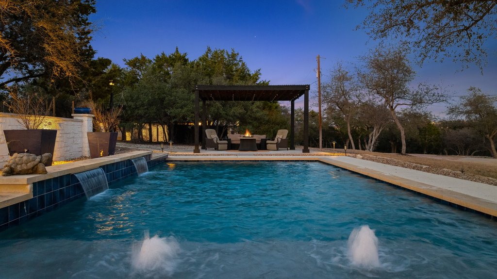 4018 Bee Creek Road Spicewood, TX 78669 - Photo 14 of 40 Resort style pool with waterfalls and custom water features.