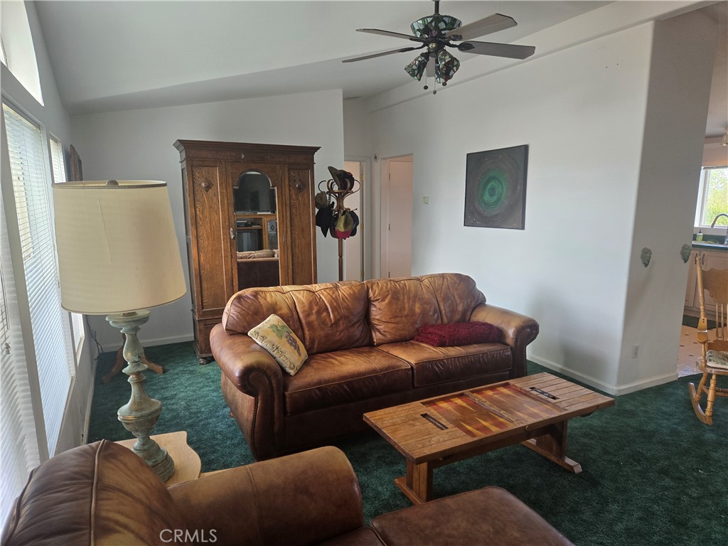 9308 Chimney Rock Road Paso Robles, CA 93446 - Photo 6 of 8 a living room with furniture and a window