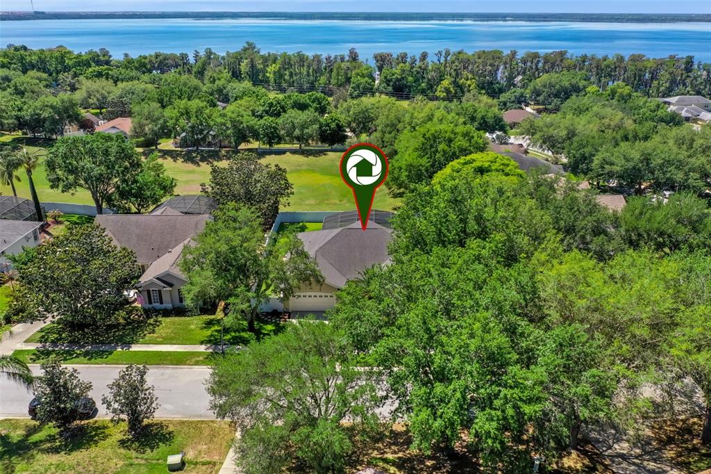 13319 Via Roma Circle Clermont, FL 34711 - Photo 37 of 43 an aerial view of a trees with a yard