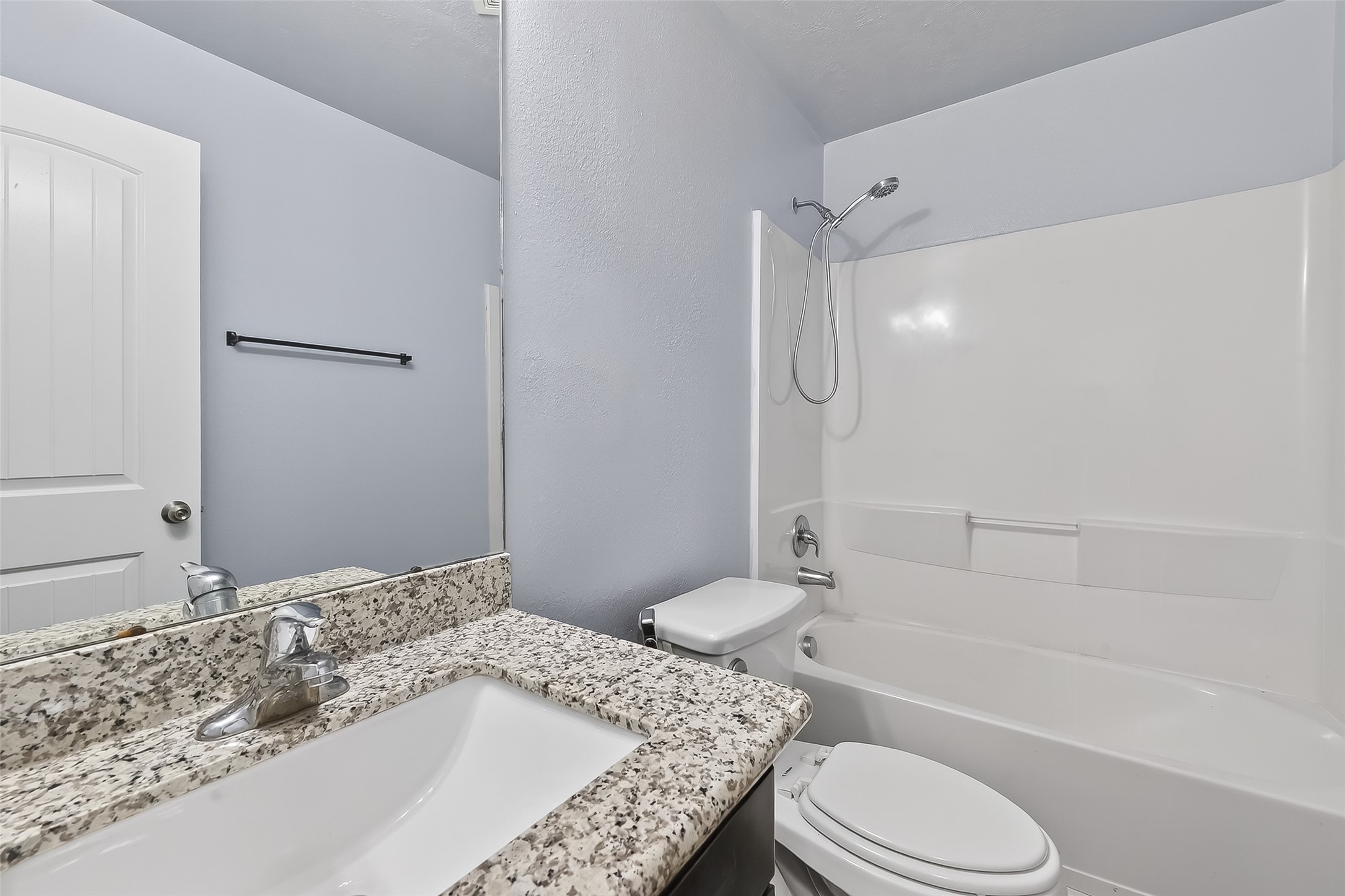 20426 Sweet Louetta Lane Spring, TX 77388 - Photo 12 of 20 a bathroom with a granite countertop sink toilet tub and shower