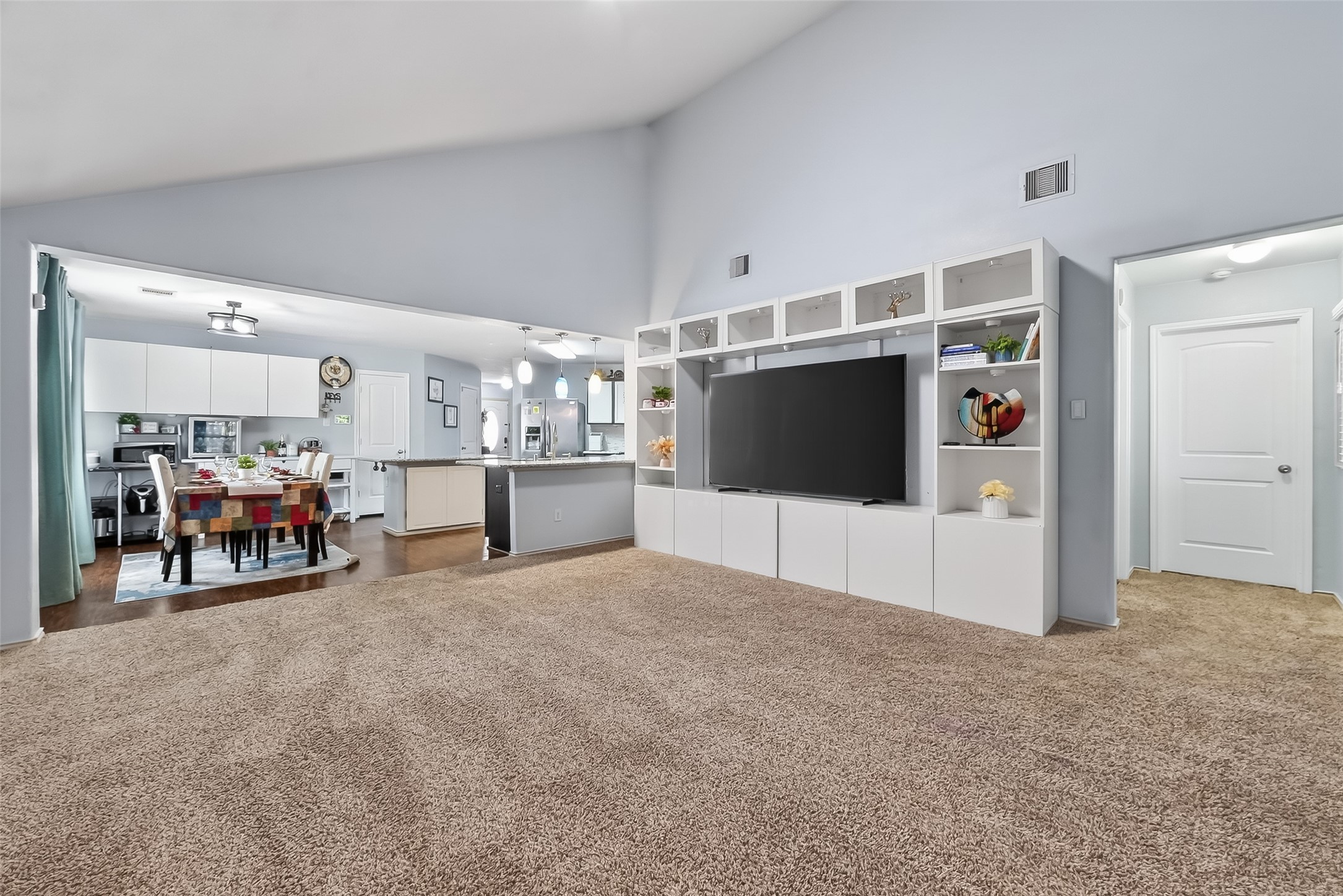 20426 Sweet Louetta Lane Spring, TX 77388 - Photo 8 of 20 a view of a room with furniture and refrigerator