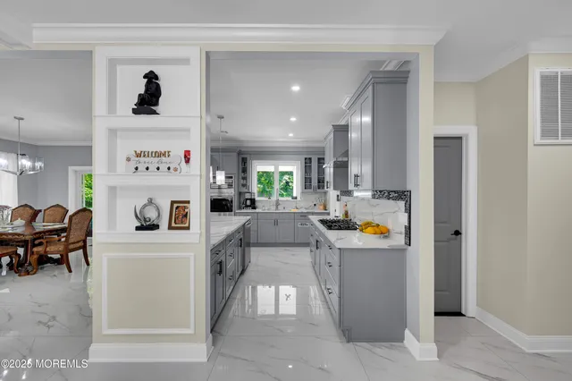 a kitchen with a refrigerator and countertop