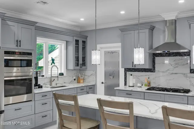 a bedroom with a bed and a lamp