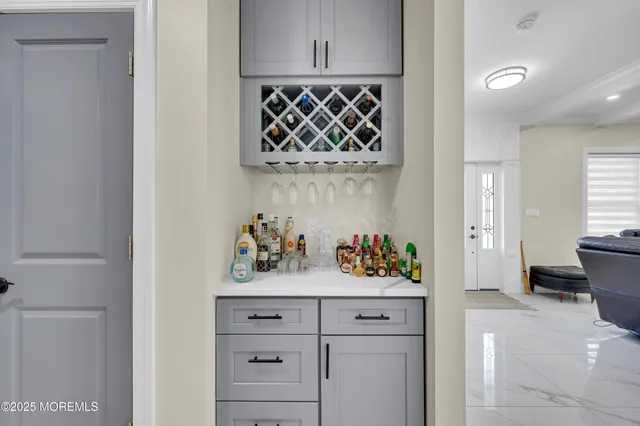 a white toilet sitting next to a bathroom sink