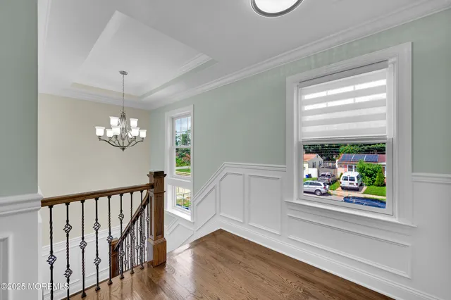 a bathroom with a double vanity sink mirror and shower