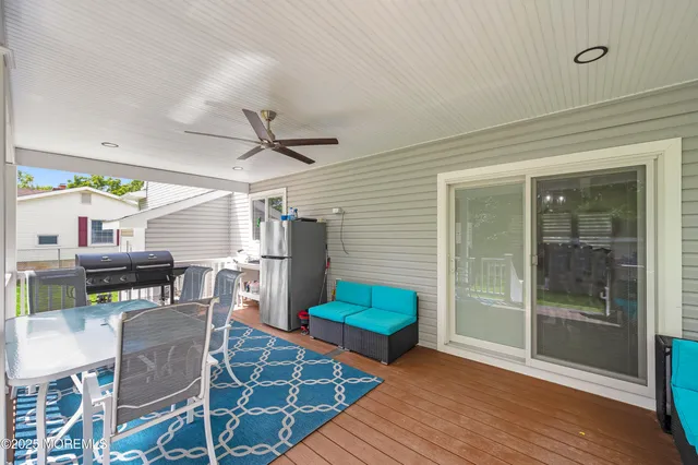 a bathroom with a shower toilet and sink