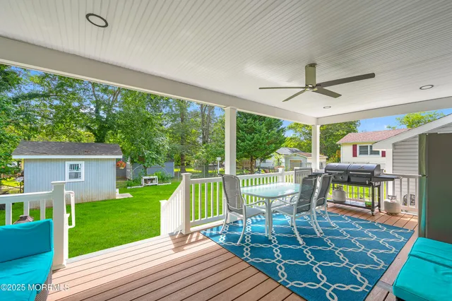 a view of a hallway with closet and a closet