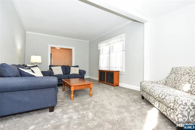 a living room with furniture and a couch