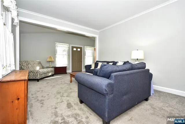 a living room with furniture and a couch