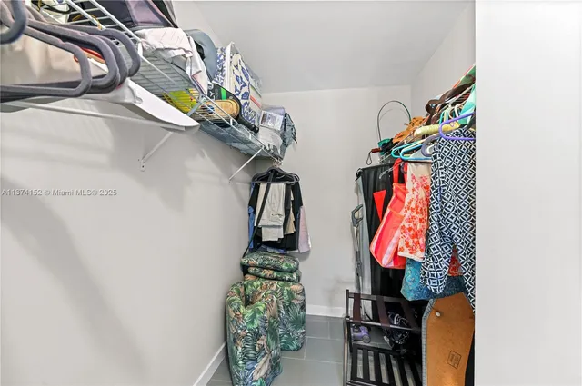 a balcony with table and chairs