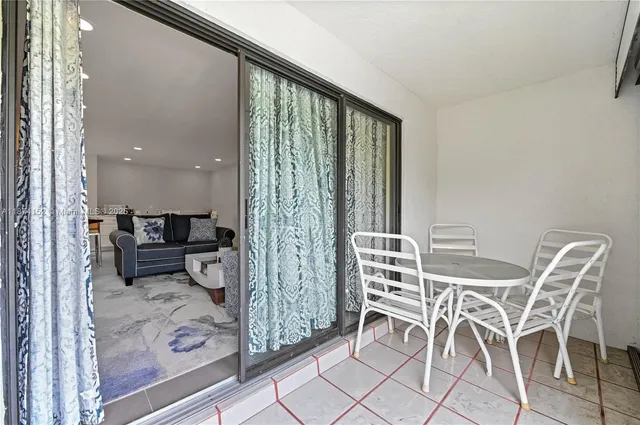 a view of a golf course with a lake