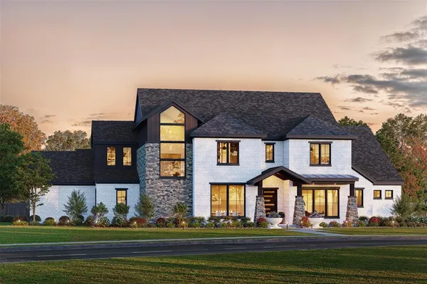 a front view of building with yard