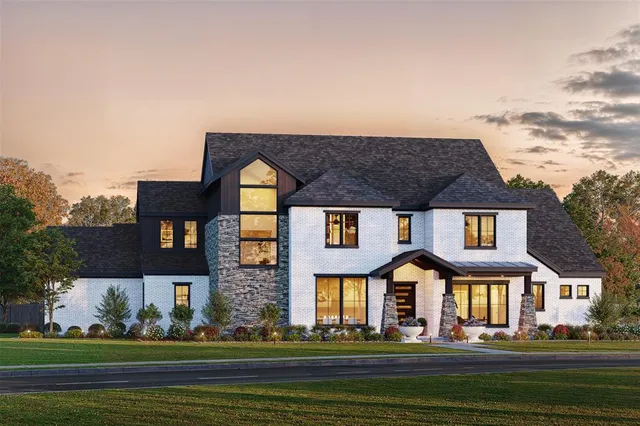 a front view of building with yard