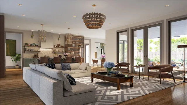 a living room with furniture and a floor to ceiling window