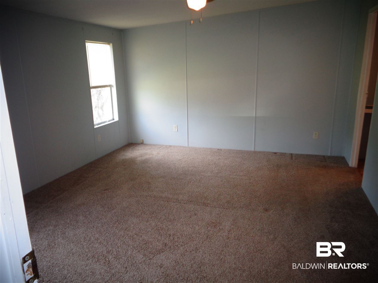 21535 A Glass And Spivey Road Robertsdale, AL 36567 - Photo 19 of 32 15x13. Carpet. Ceiling fan/light.