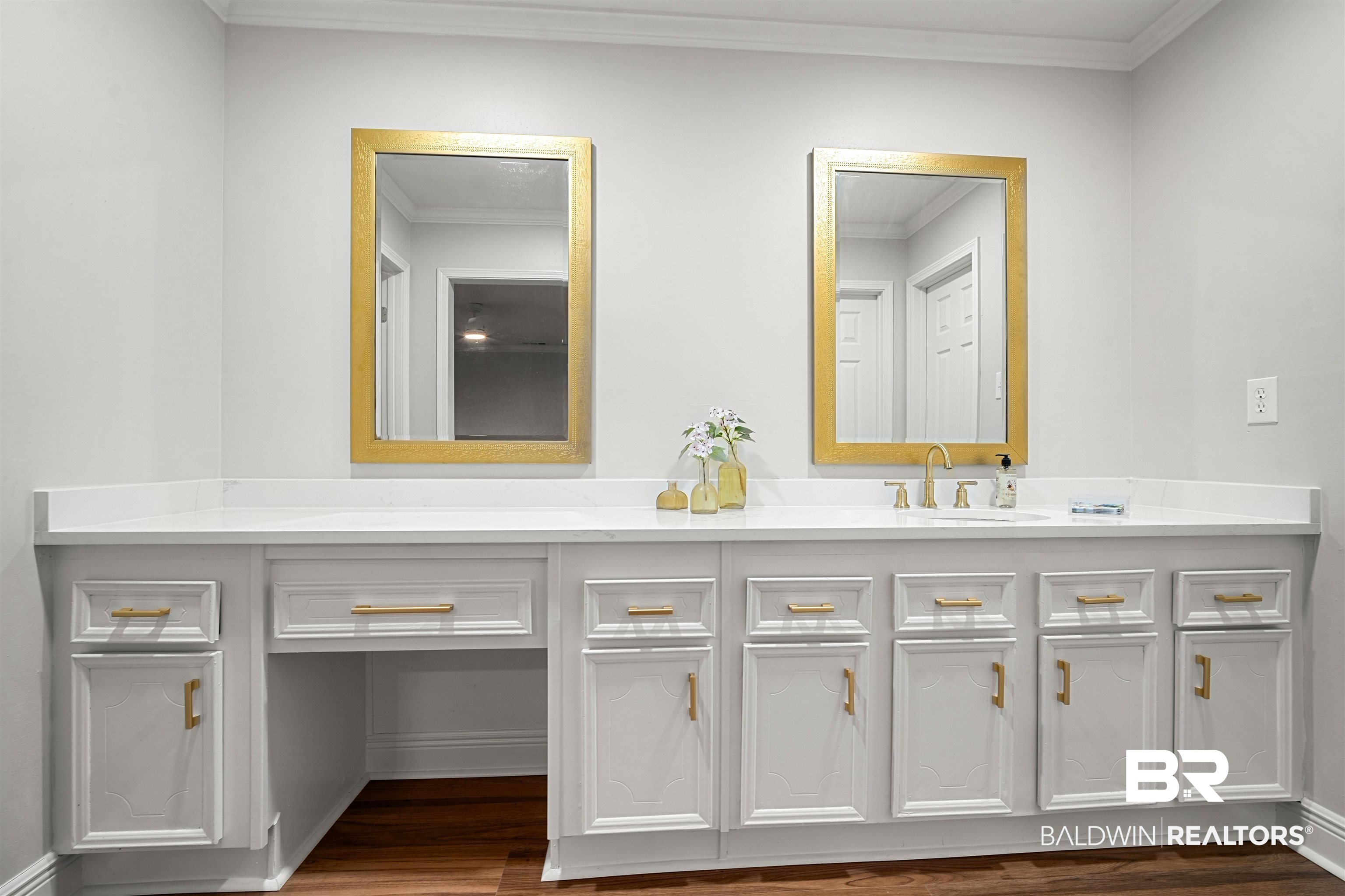 3050 Lacoste Road Mobile, AL 36618 - Photo 15 of 30 Bathroom featuring double vanity, ornamental molding, and dark wood finished floors