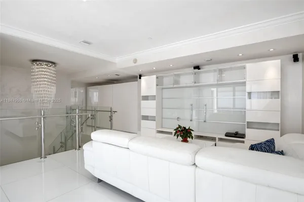 a view of an empty room with glass door
