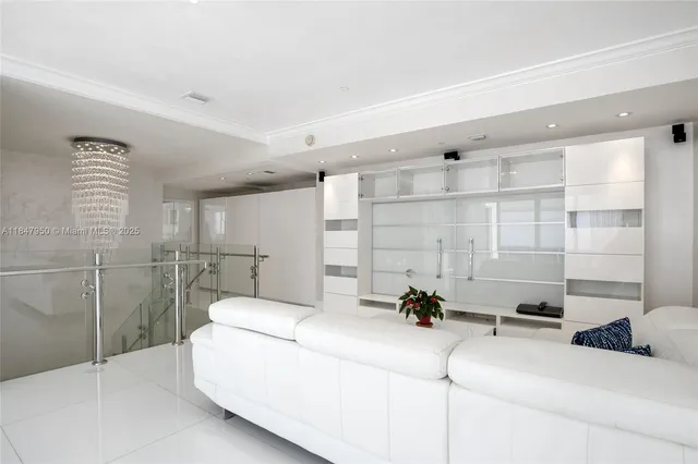 a view of an empty room with glass door