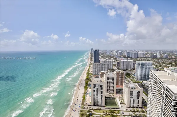 a view of a city with tall buildings