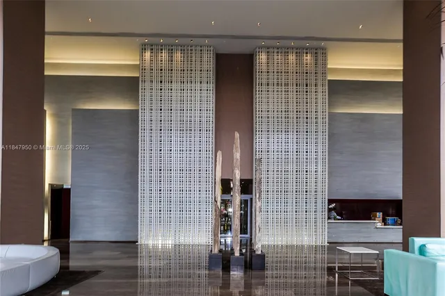 a view of living room filled with furniture