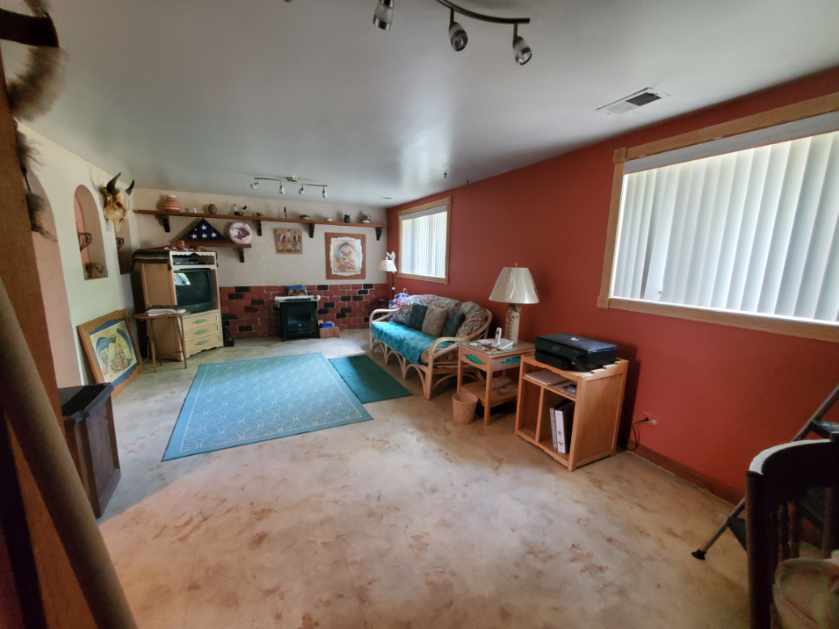 6139 107th Street Chicago Ridge, IL 60415 - Photo 13 of 16 a living room with furniture and a window