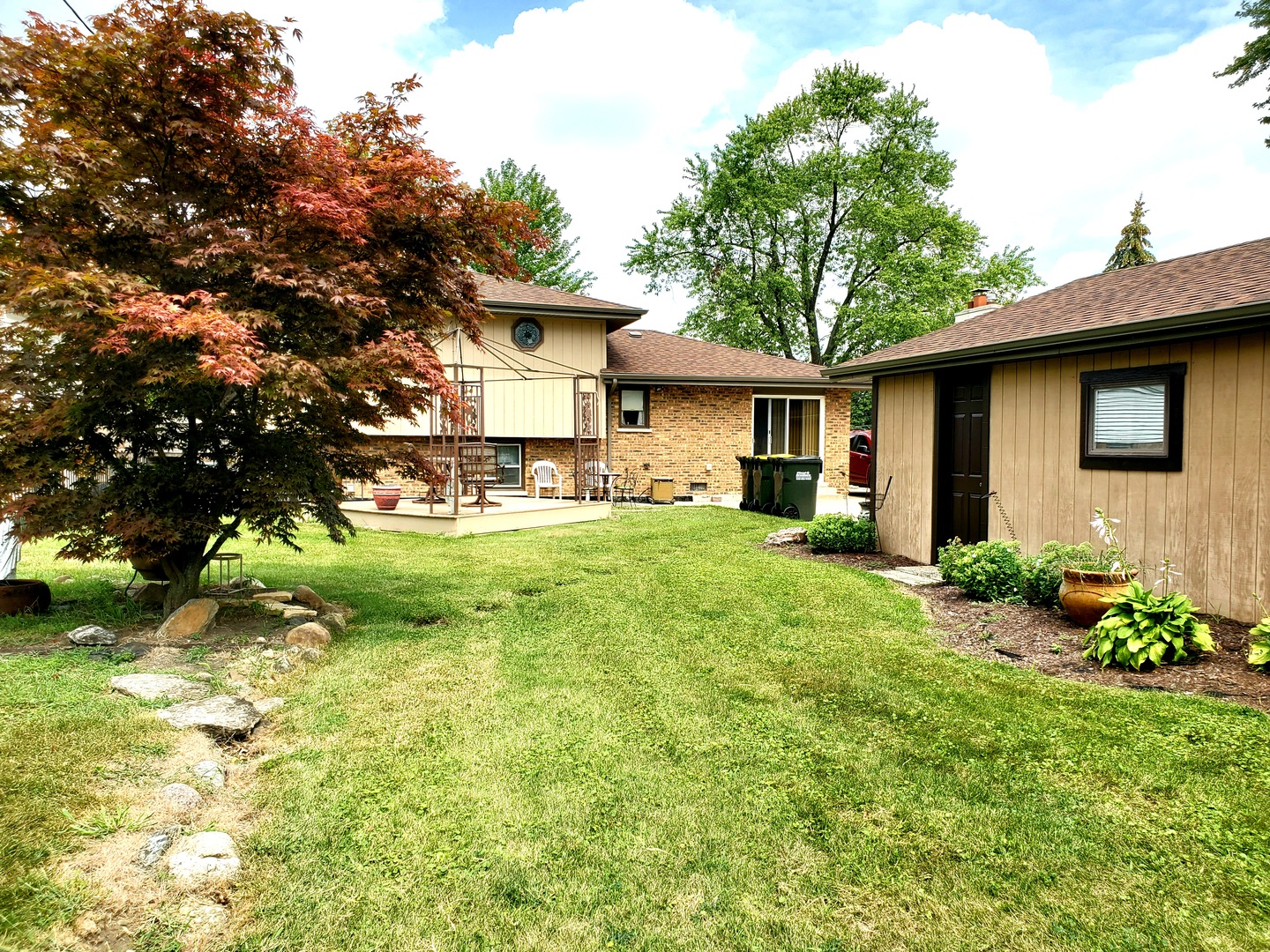 6139 107th Street Chicago Ridge, IL 60415 - Photo 15 of 16 a front view of house with yard and green space