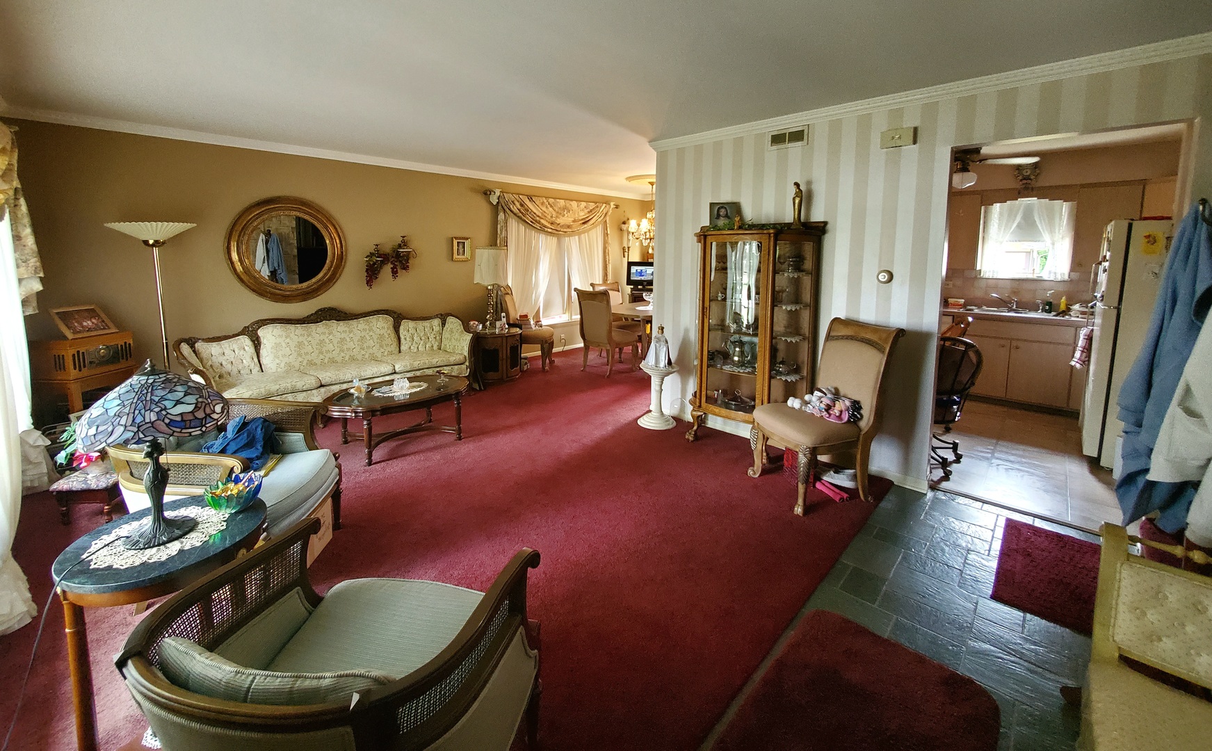 6139 107th Street Chicago Ridge, IL 60415 - Photo 10 of 16 a living room with furniture and a flat screen tv